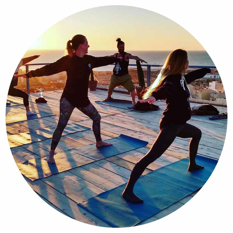 terrace Yoga in the sunset at pro surf camp morocco